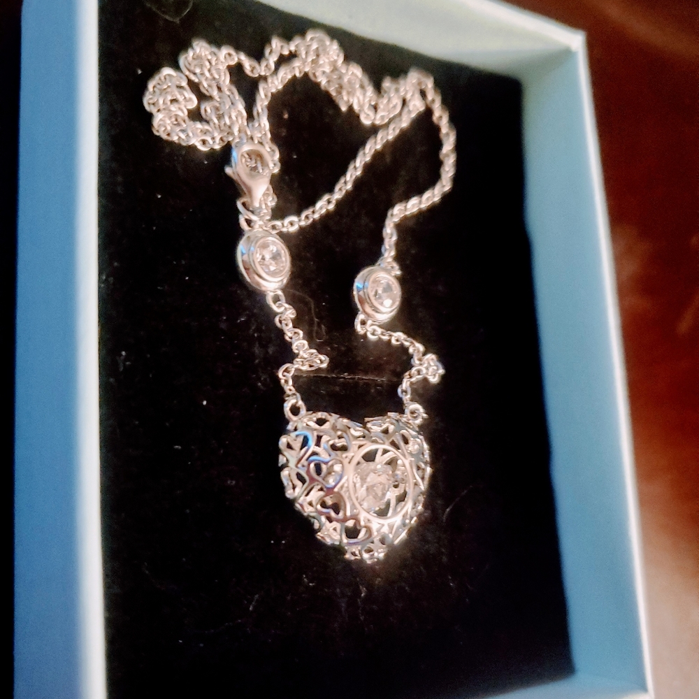 Sterling silver dancing heart necklace